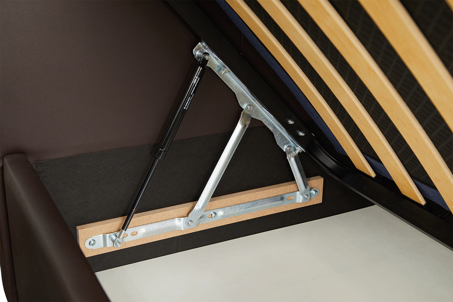 газлифт для кровати фото